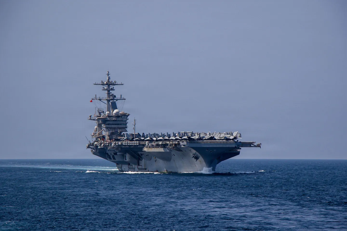 Naval ship at sea representing energy tensions