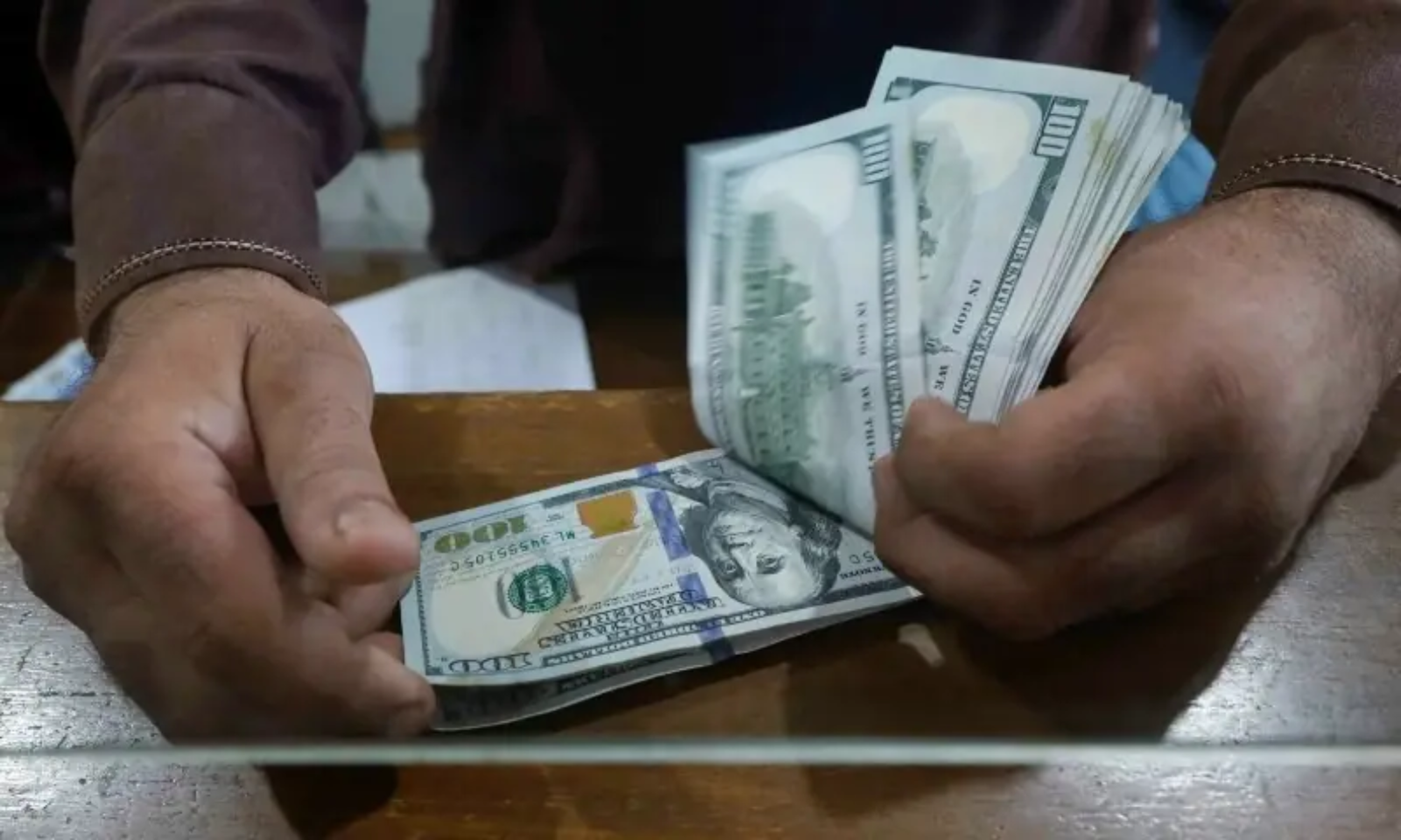 Stacks of currency notes representing trade deficit