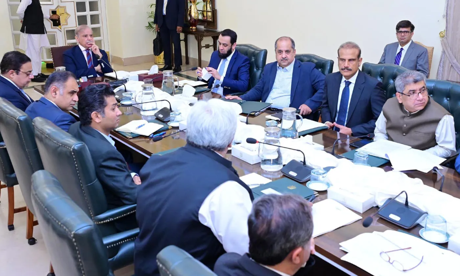 Officials reviewing revenue documents