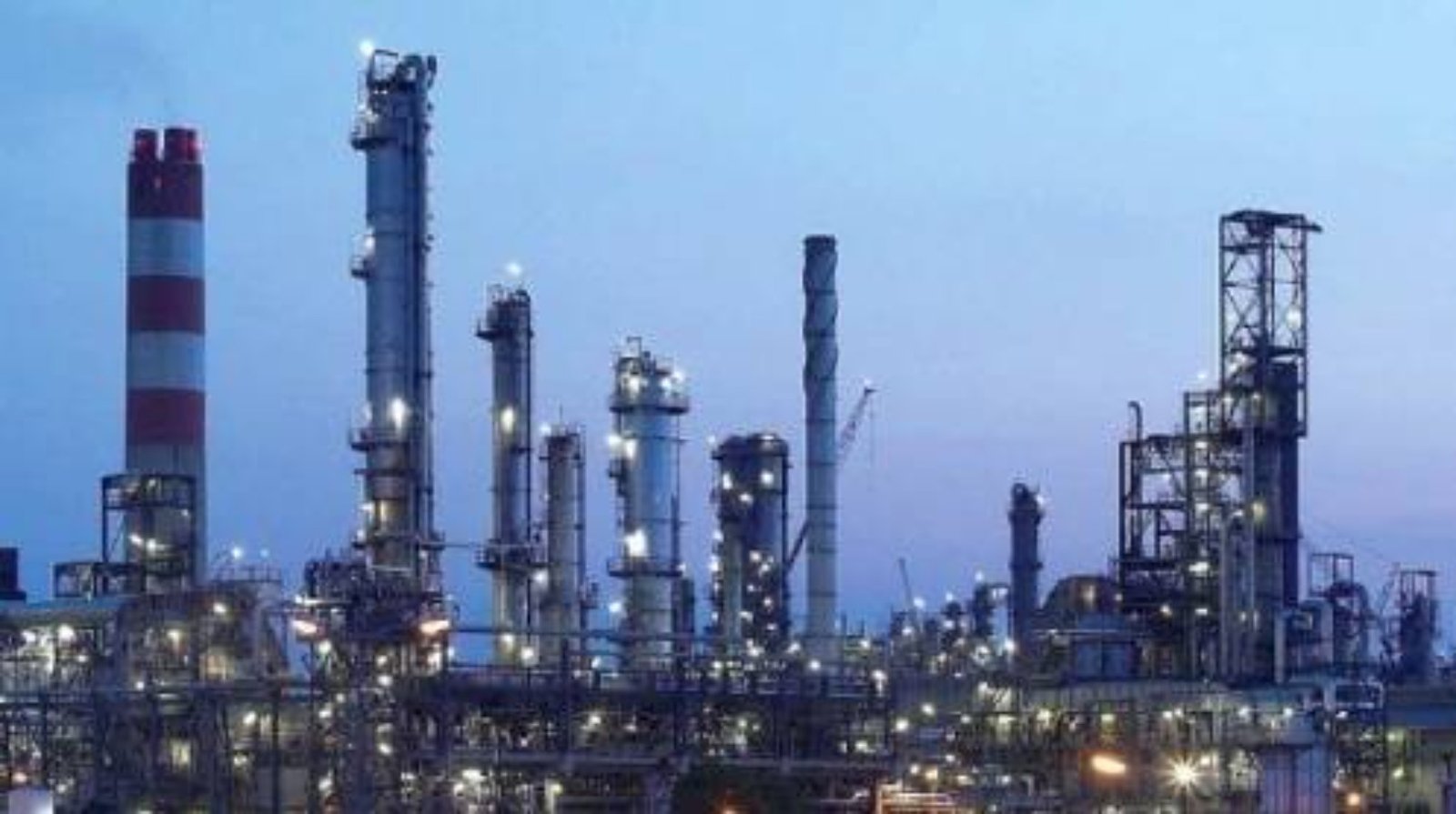 Industrial oil refinery at dusk