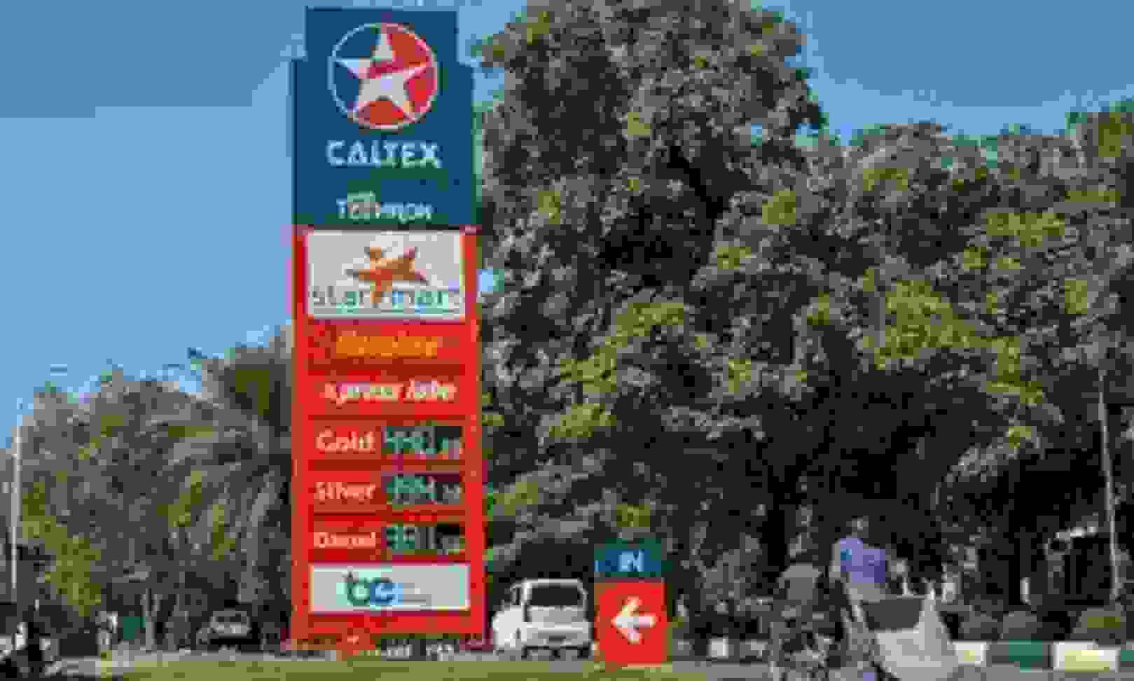 Fuel pump station representing petrol price cut